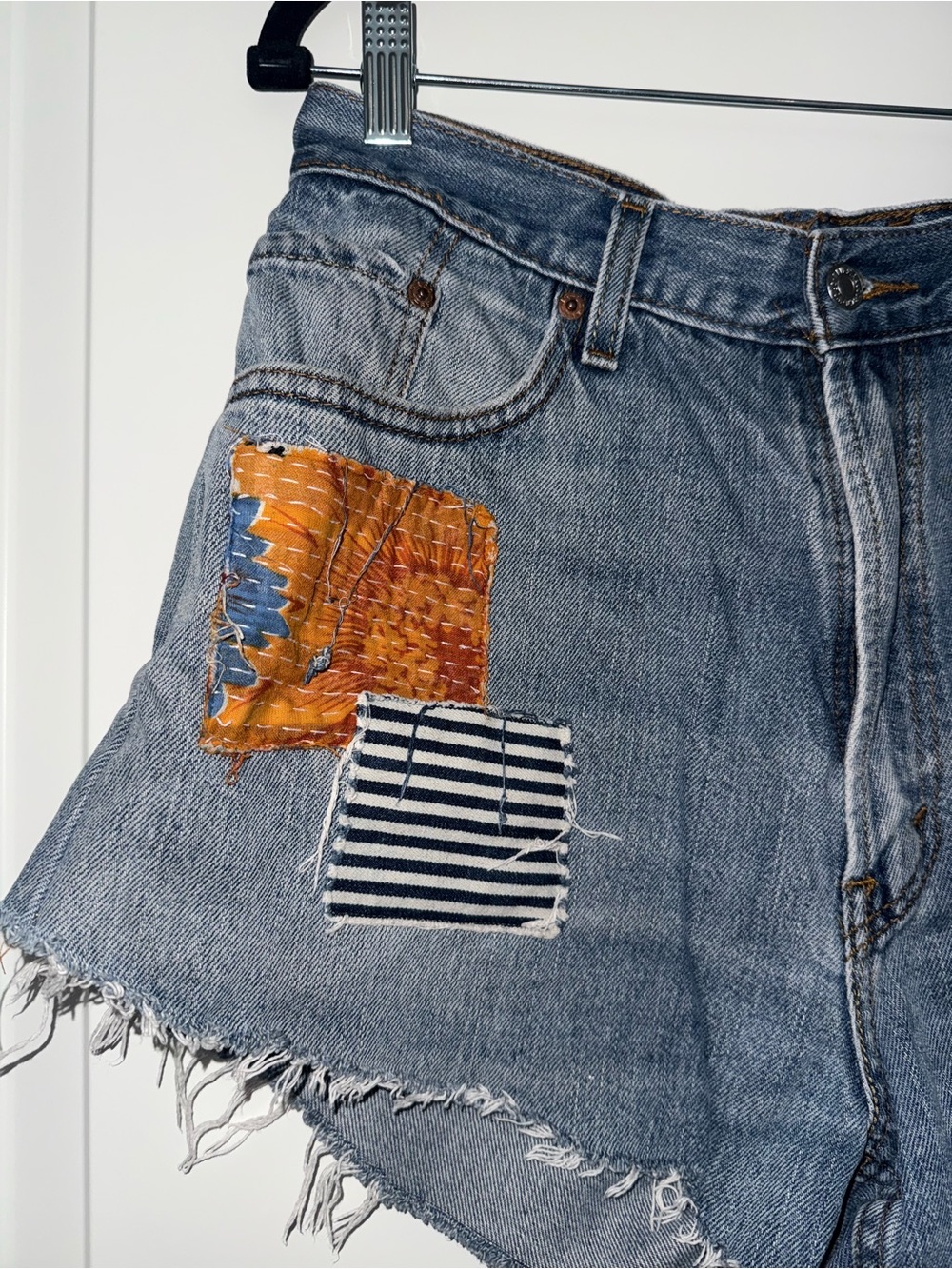 Levi’s Patchwork Denim Cutoff High Waisted Shorts - Picture 4 of 9